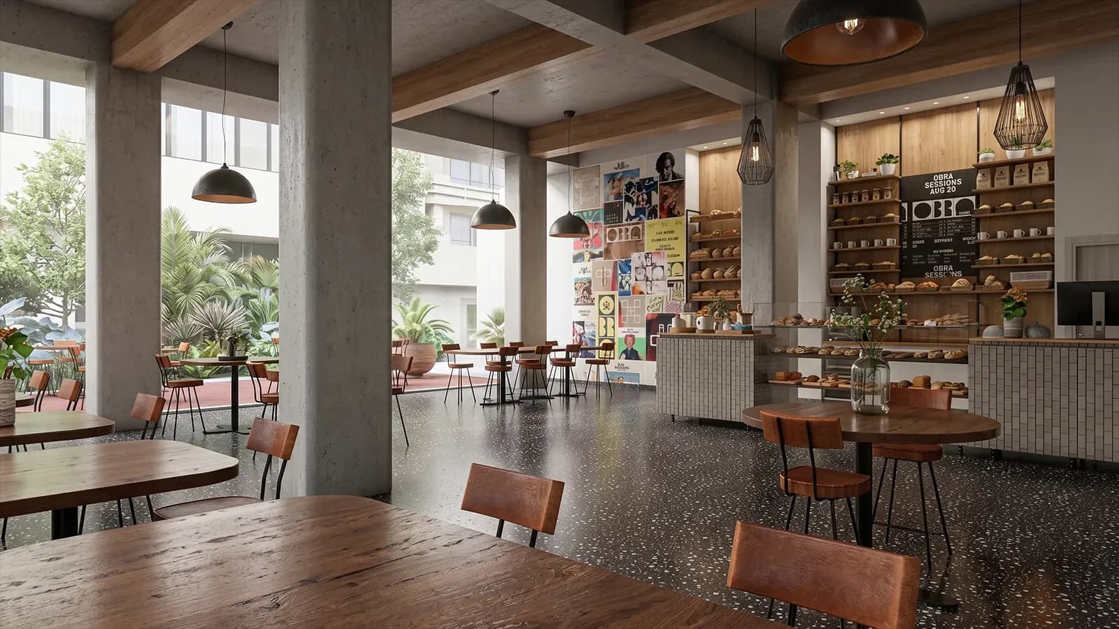 Zona común de OBRA Hotels Medellín: columnas de concreto, mesas de madera, plantas y el mostrador de Ganso & Castor al fondo.